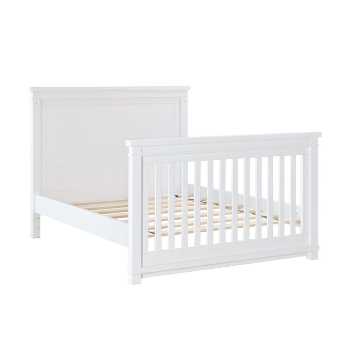 A white bed with wooden slats and a wooden headboard, featuring the Rowan Full Rail design.