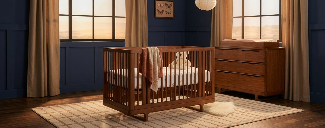 Maxi Cosi Nursery Embraced Forms Convertible Crib in Chestnut, shown in a beautiful nursery setting at Kids N Cribs Bay Area