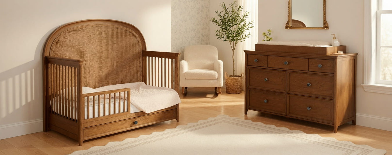 Maxi Cosi Nursery Quiet Luxury Convertible Crib in Dolce Oak, shown in a beautiful nursery setting at Kids N Cribs Bay Area