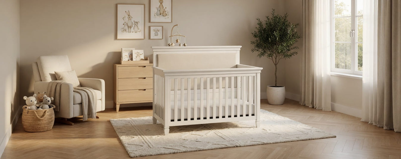 Namesake Darlington Convertible Crib in Warm White with fabric panel, shown in a beautiful nursery setting at Kids N Cribs Bay Area