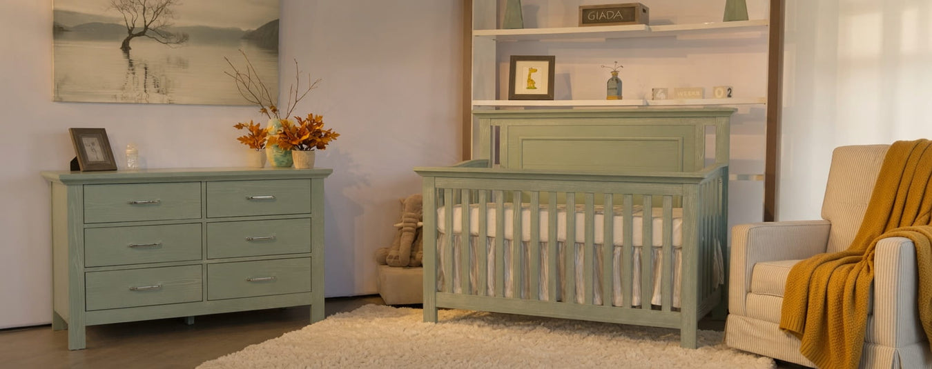 Pali Como Flat Convertible Crib in Giada, shown in a beautiful nursery setting at Kids N Cribs Bay Area