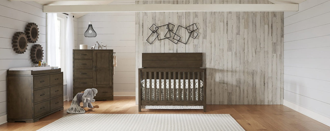 Westwood Dovetail Convertible Crib in Graphite, shown in a beautiful nursery setting at Kids N Cribs Bay Area
