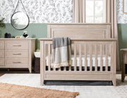 Complete Beckett Sandbar nursery furniture package with crib, dresser, and bookcase