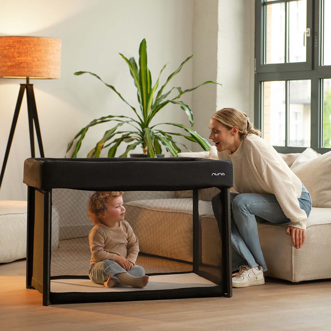 Nuna travel gear setup including playard and accessories at Kids N Cribs