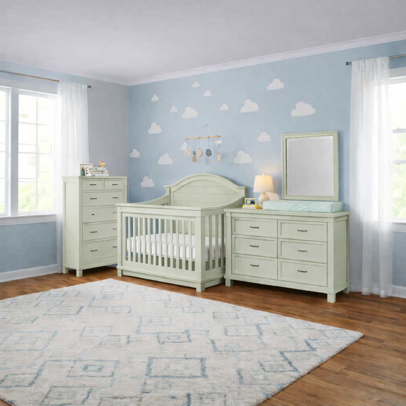 Appleseed Rowan 3-piece nursery set in sage featuring arch top crib, double dresser, and tall chest in a styled nursery room