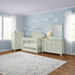 Appleseed Rowan 3-piece nursery set in sage featuring arch top crib, double dresser, and tall chest in a styled nursery room