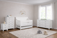 Appleseed Rowan 4-piece nursery set in White with flat-top crib, double dresser, tall chest, and nightstand